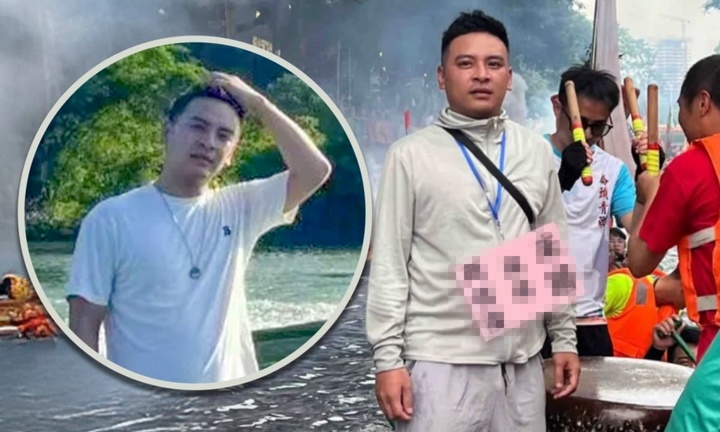 Người đàn ông 35 tuổi đeo biển 