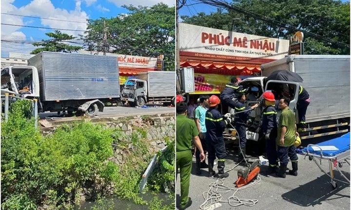 Clip: Camera an ninh ghi lại cảnh xe tải tông nhau, 2 tài xế kẹt trong cabin biến dạng 