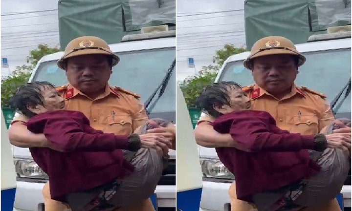 Xúc động cảnh CSGT cứu cụ bà 94 tuổi ngâm mình trong nước lũ nhiều ngày