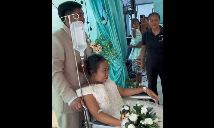Cô dâu đi xe cứu thương đến nhà thờ làm lễ cưới ngay sau khi sinh
