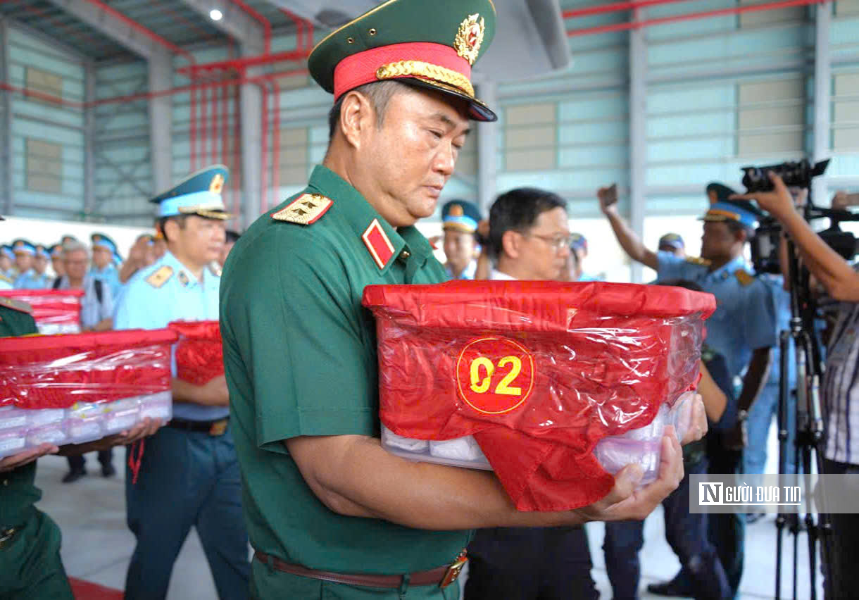 Chuyến bay đặc biệt đưa 7.104 mẫu hài cốt liệt sĩ đi tìm lại danh tính - 9
