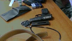 Cướp tiền rồi cố thủ, nổ súng chống trả công an