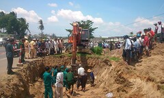 Phát hiện mộ liệt sĩ tập thể nằm sát đường quốc lộ