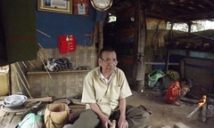 Người cựu binh tàn tật nuôi cháu thiểu năng