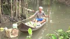 Người đàn ông miệt mài vớt rác không công trên kênh Kiều Hạ