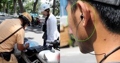 Chạy xe máy đeo tai nghe có bị phạt không?