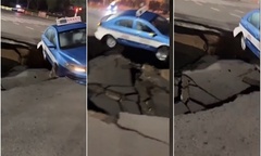 Video: Xe taxi suýt bị  "hố tử thần " nuốt chửng