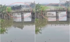 Clip: Xe tải tông gãy lan can cầu, lao xuống đập nước