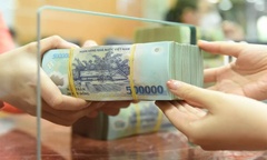 Vì sao tiền gửi của dân vào ngân hàng tăng mạnh còn các tổ chức kinh tế lại giảm?