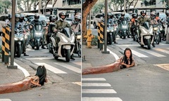 Cảnh tượng người phụ nữ bò ra từ miệng cống giữa ban ngày khiến cả phố sửng sốt!