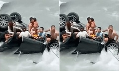 Clip: Nghẹt thở cảnh giải cứu ô tô chở 7 người lao xuống dòng nước xiết