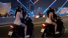 Tịch thu phương tiện nam thanh niên chở bạn gái đi xe buông 2 tay trên cầu Ba Son