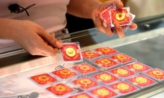 Vì  sao có tục mua vàng ngày vía thần tài?