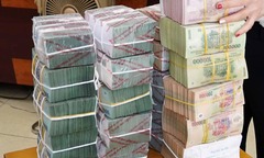 Đổi tiền lẻ dịp Tết để ăn chênh lệch có bị phạt không?