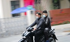 Đi chúc Tết nguyên đán Bính Ngọ bằng xe máy có phải đội mũ bảo hiểm?