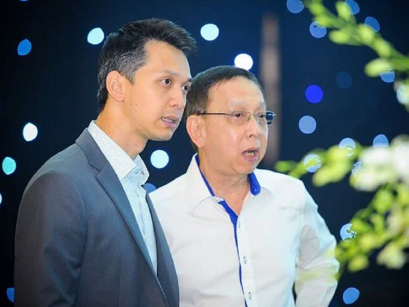 Ông Trần Mộng Hùng cùng con trai Trần Hùng Huy.