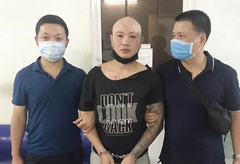 Nguyễn Văn Sơn khi bị bắt về Cơ quan Cảnh sát điều tra. Ảnh: Báo Nghệ An