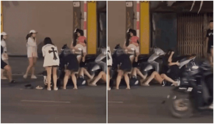 Hình ảnh 12 nữ sinh đánh nhau giữa đường ở Hà Nội. Ảnh: Dân Trí