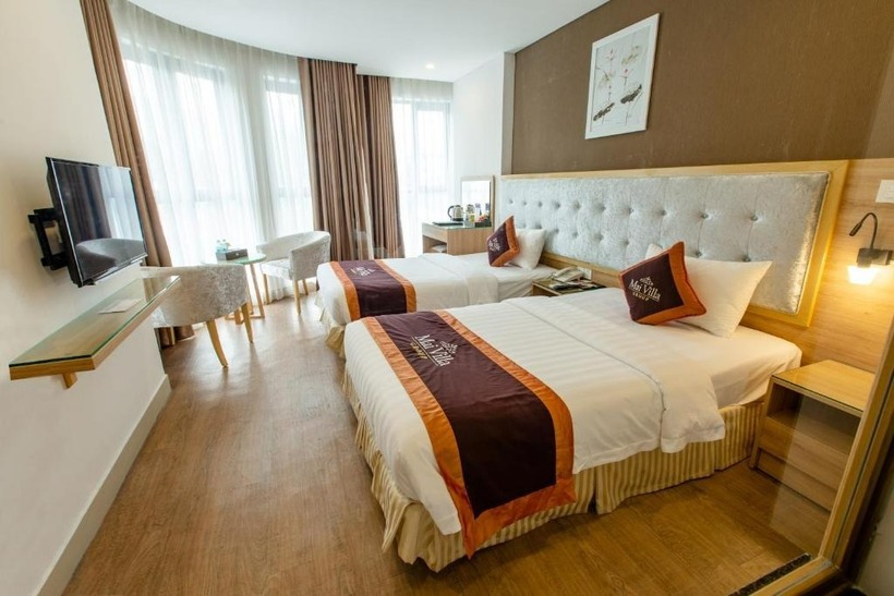 Việc có nhiều gối trên giường cũng tạo ra một cảm giác sang trọng và đẳng cấp. Ảnh minh họa