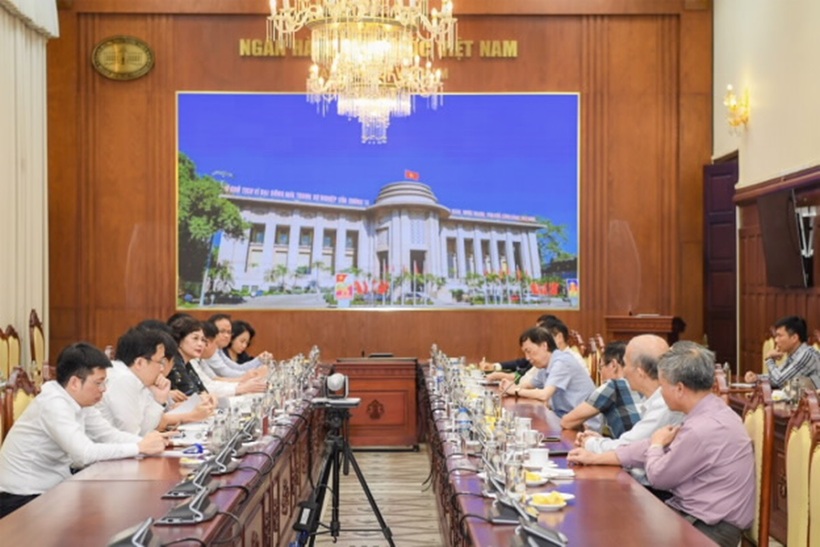 Quang cảnh cuộc họp. Ảnh: NHNN