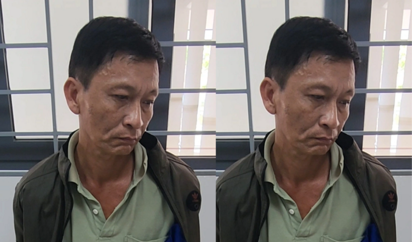 Nguyễn Thanh Giang tại cơ quan công an. Ảnh: Dân Trí