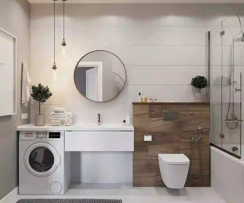Không nên đặt máy giặt gần vòi sen, bồn tắm, lavabo càng tốt để hạn chế tối đa việc nước bắn vào máy. Ảnh minh họa