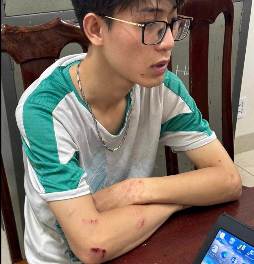 Vũ tại cơ quan điều tra. Ảnh: Giao Thông