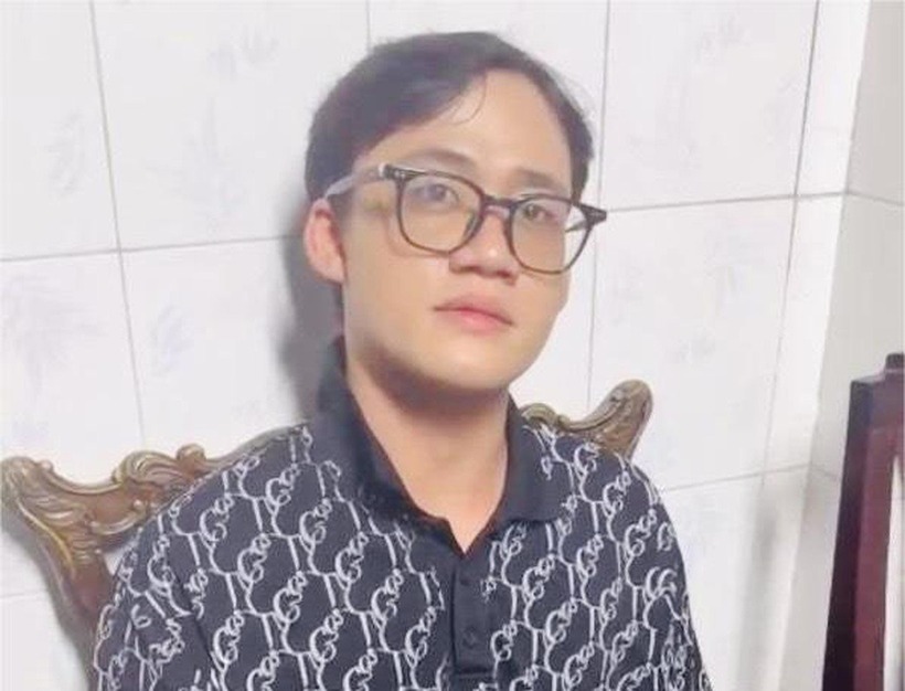 Nam bị bắt giữ sau khi đánh chết bác ruột. Ảnh: Người lao động
