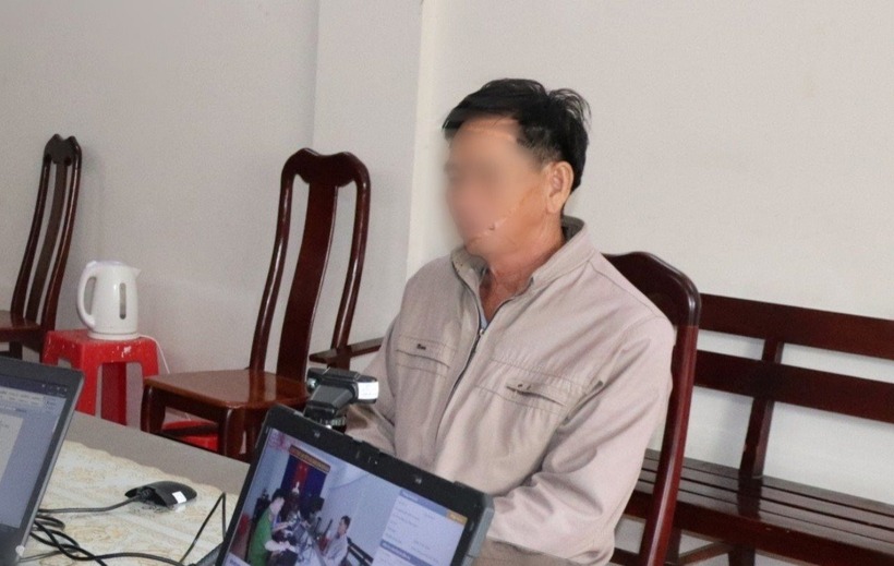 Huỳnh Văn Lệ- nghi phạm chém con dâu tử vong ở Sóc Trăng tại cơ quan công an. Ảnh: Công lý