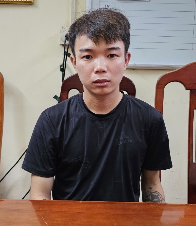 Bùi Tuấn Anh tại cơ quan công an.