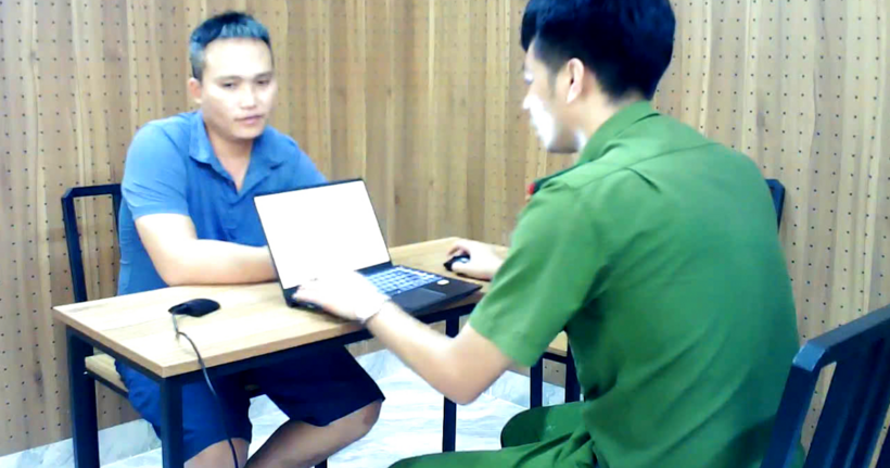 Vũ Văn Hùng tại cơ quan công an.