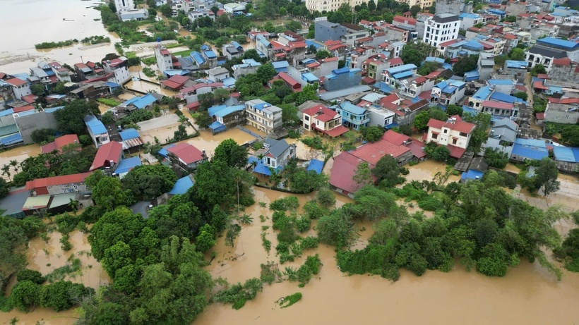 Lũ sông Cầu dâng cao quá nhanh. Ảnh: Thanh Niên