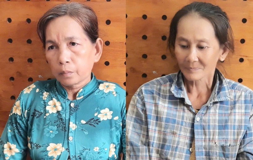 Bùi Thị Điệp (trái) và Nguyễn Thị Hồng Tươi tại cơ quan công an. (Ảnh: Dân trí)