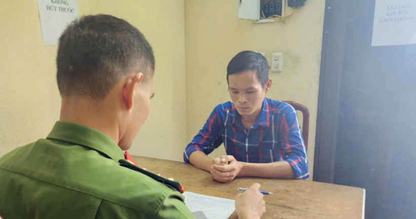 Trần Minh Hóa tại cơ quan công an.