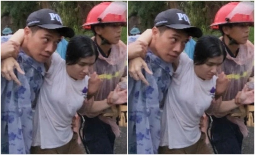 Nguyễn Thị Thu Trang thời điểm được lực lượng công an đưa từ vực lên. (Ảnh: PLO)