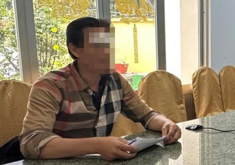 Trần Thành Lợi tại cơ quan công an. (Ảnh: Báo Giao thông)