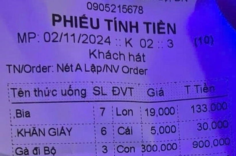 Trong phiếu tính tiền của quán karaoke ở Đà Nẵng, có ghi mặt hàng gây chú ý là món "gà đi bộ" với giá 300.000 đồng/con. Ảnh: Sức khỏe và Đời sống