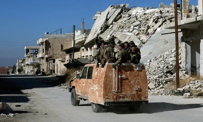 Phiến quân Syria tại khu vực ngoại ô thành phố Aleppo. Ảnh: Guardian