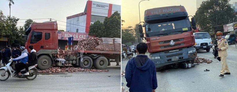 Hiện trường vụ xe máy "kẹp 3" chui vào gầm ô tô đầu kéo, 1 người tử vong. (Ảnh: Giao thông)