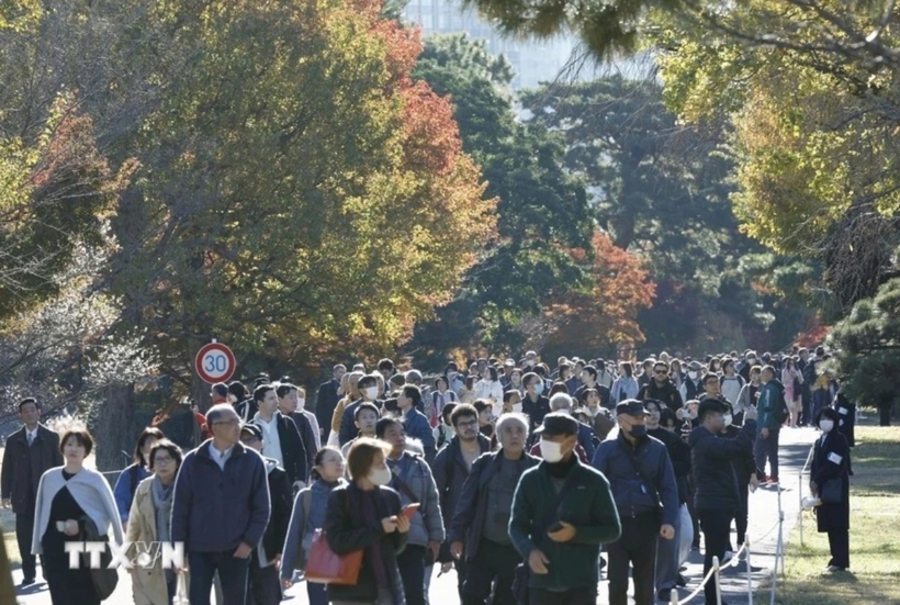 Người dân ở Tokyo (Nhật Bản). Ảnh: Kyodo/TTXVN