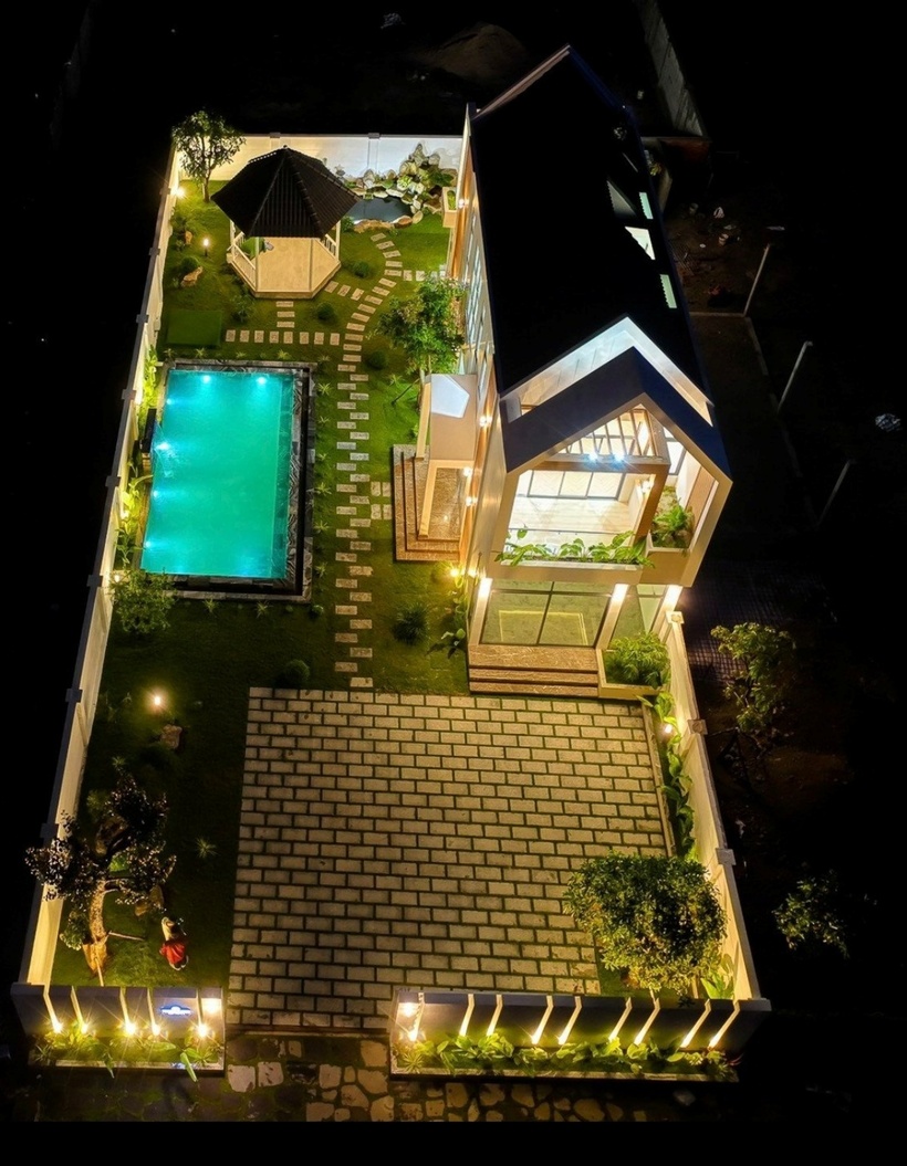 Lối đi trong vườn được lát gạch vừa giúp chống trơn, vừa đẹp mắt.