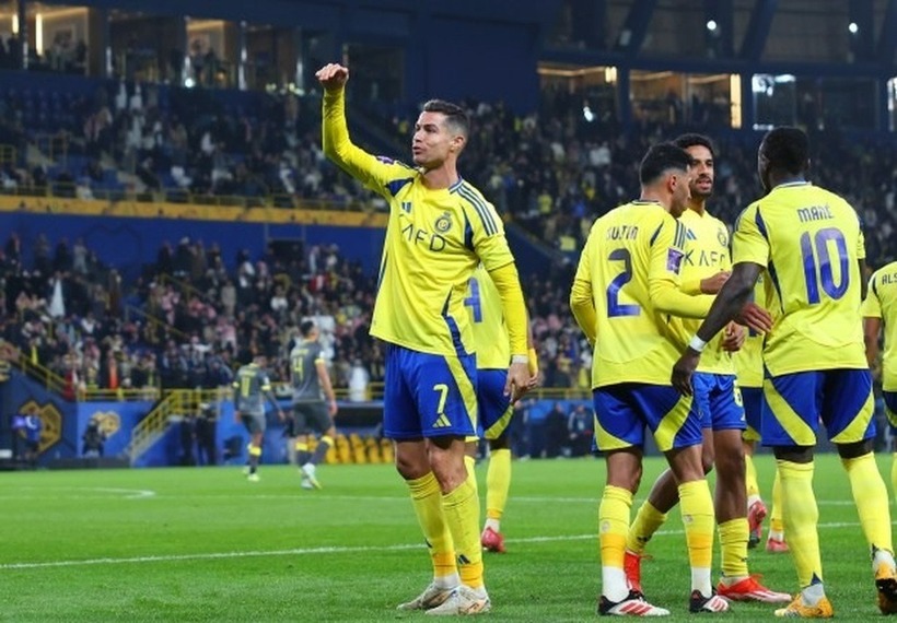 Thay vì ăn mừng bằng động tác "Siuuu" quen thuộc thì Ronaldo đã thể hiện bằng một phong cách mới. Ảnh: Getty.