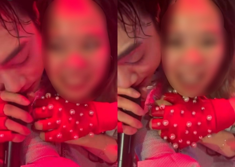 Soobin Hoàng Sơn có hành động ôm, kề má với fan nữ trong buổi biểu diễn. Ảnh: Phụ Nữ Mới