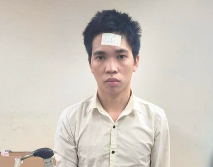 Đối tượng truy nã Nguyễn Thọ Phúc bị bắt giữ. Ảnh: Lao Động