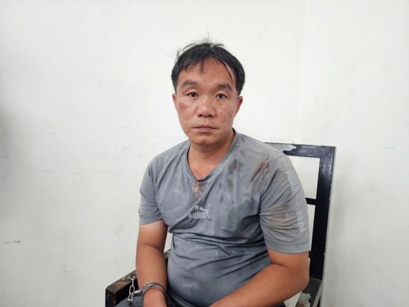 Đối tượng Dương Hữu Trí tại cơ quan công an. Ảnh: Công An Nhân Dân