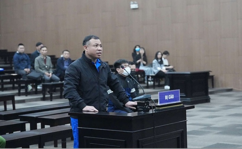 Bị cáo Nghiêm Quang Minh (chủ tòa chung cư mini cháy làm 56 người chết) tại phiên tòa. (Ảnh: VietnamNet)