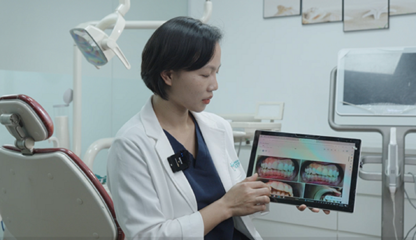 Bác sĩ Nguyễn Thị Quỳnh đang tư vấn về quá trình chỉnh nha cho khách hàng