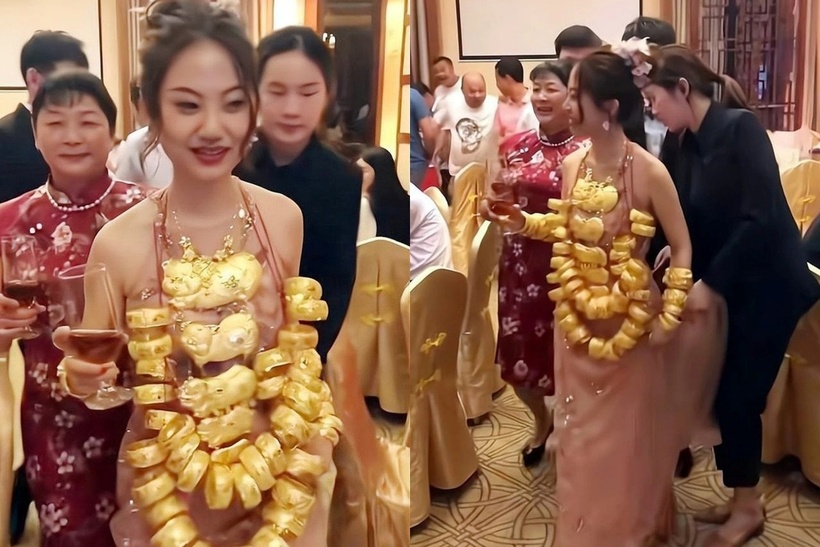 Việc đeo quá nhiều vàng trên người khiến cô dâu trĩu cả cổ, gặp khó khăn trong việc di chuyển. Ảnh: Sina.