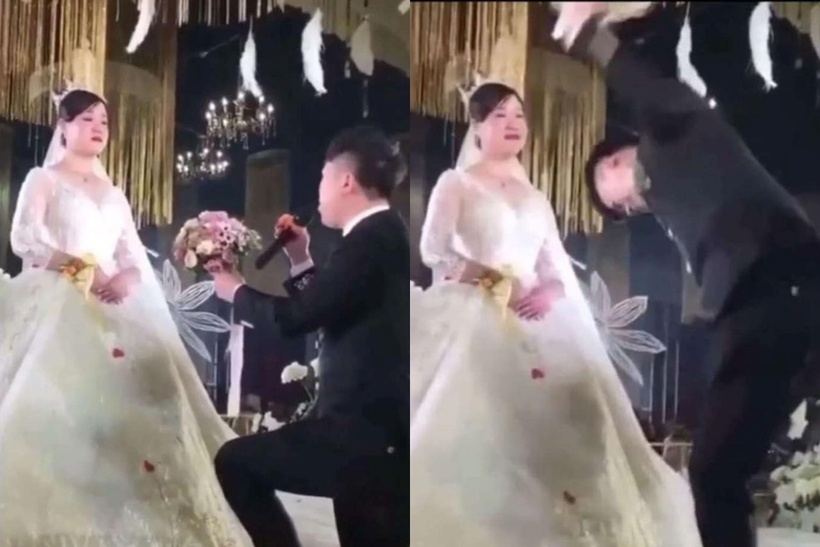 Cô dâu "trơ như tượng" khi chú rể quỳ gối trao hoa cưới. Ảnh: Sohu.