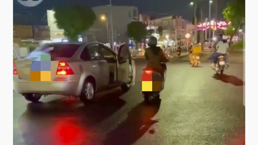 Vụ người phụ nữ đi xe máy hung hãn "tạt đầu ô tô, đập bể kính xe": Hé lộ nguyên nhân bất ngờ - 1